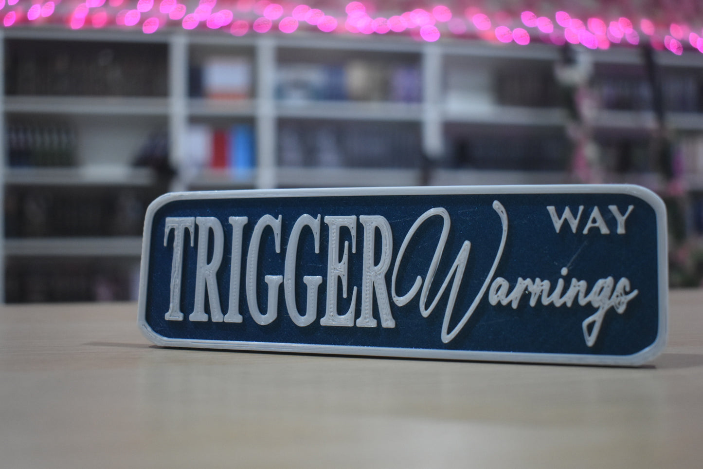Trigger warnings 3d printed shelf sign