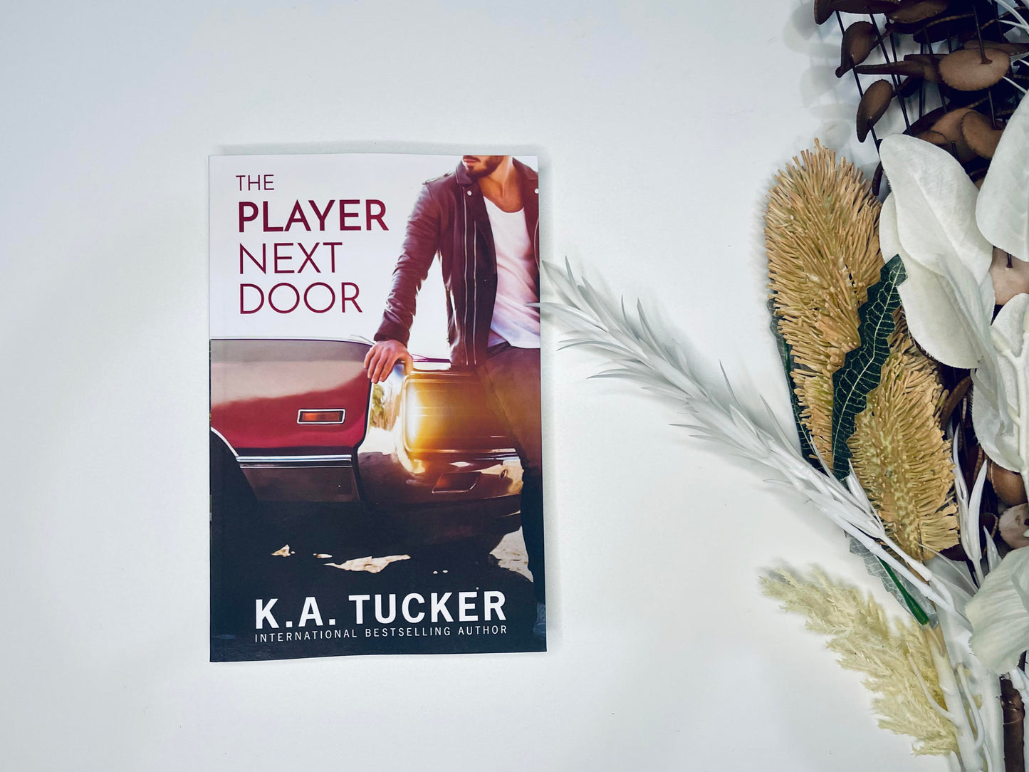 The Player Next Door by K.A. Tucker