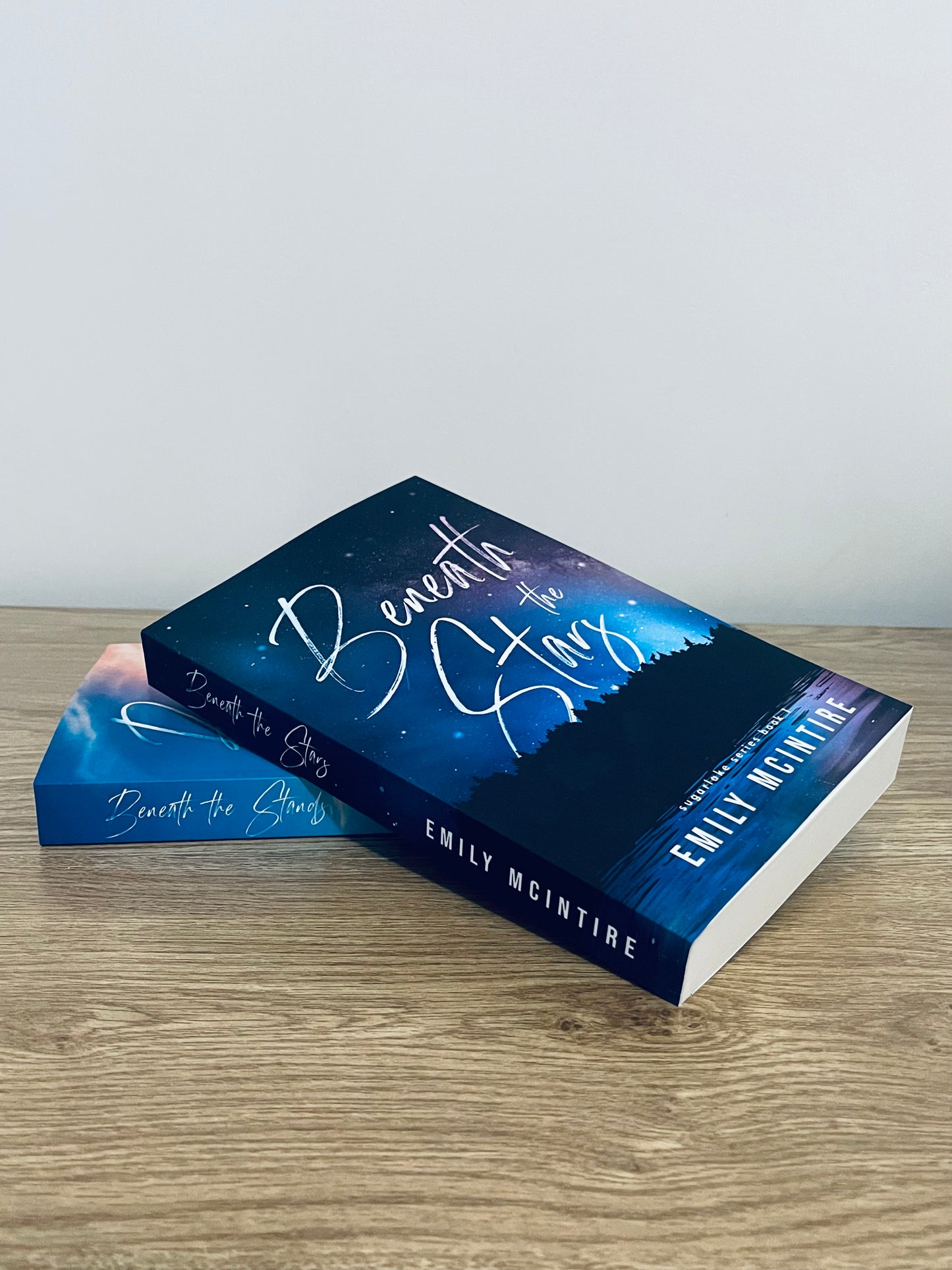 Beneath The Stands by Emily McIntire (Sugarlake #2)