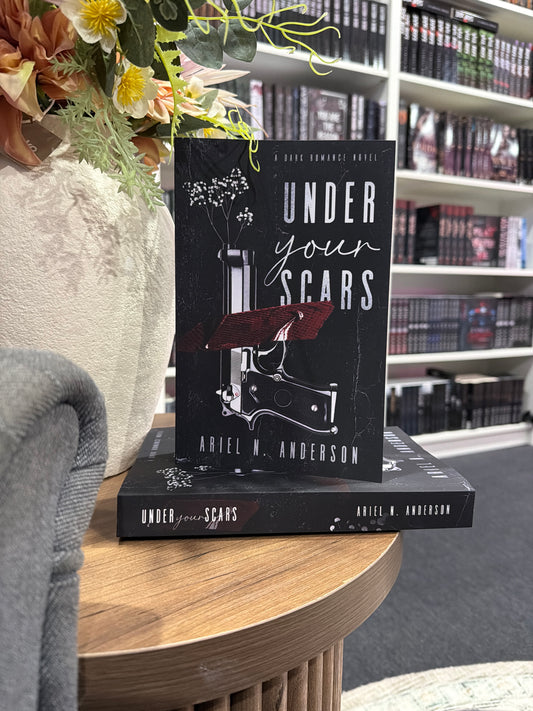Under your scars by Ariel N. Anderson