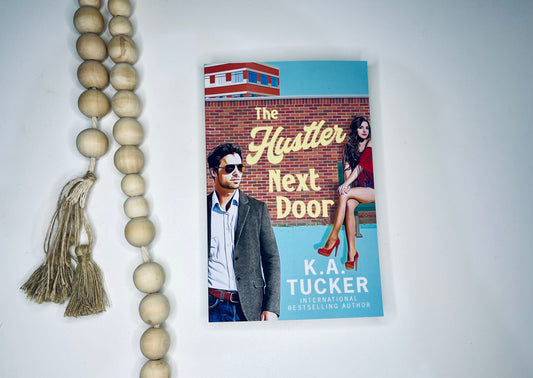 The Hustler Next Door by K.A. Tucker